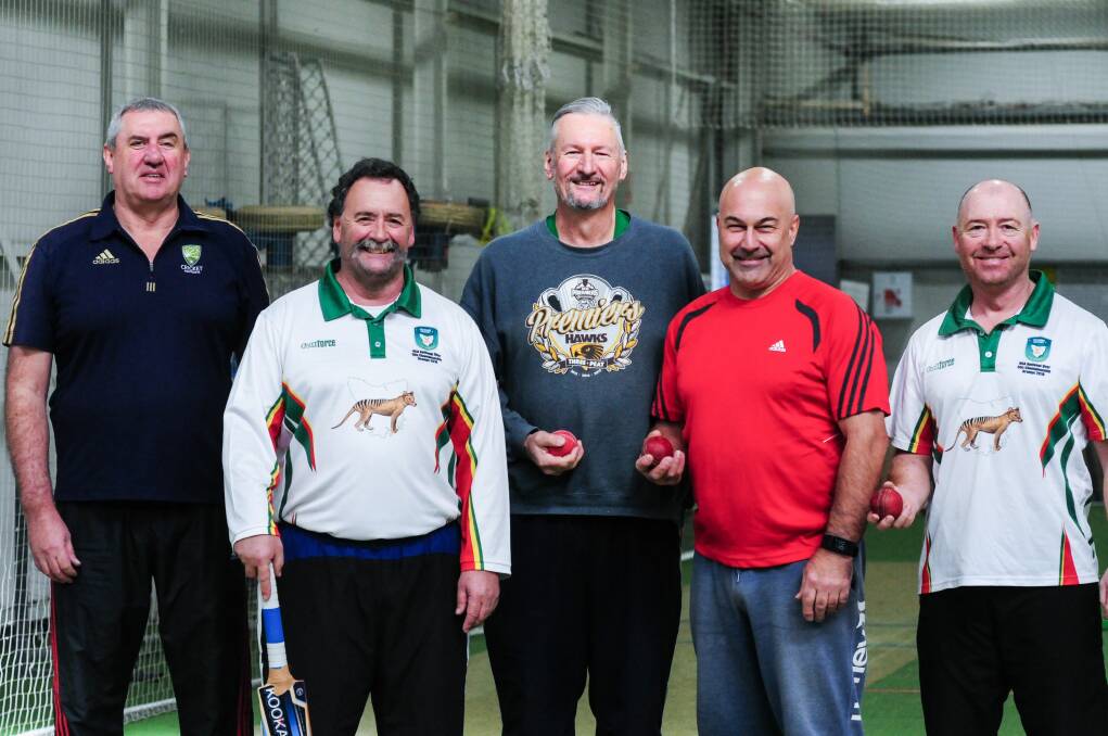 Proud: Tasmanian over-50s players Phil Murfet, Michael Claxton, David Fry, Claude Orlando and Dion Smith. Pictures: Neil Richardson
