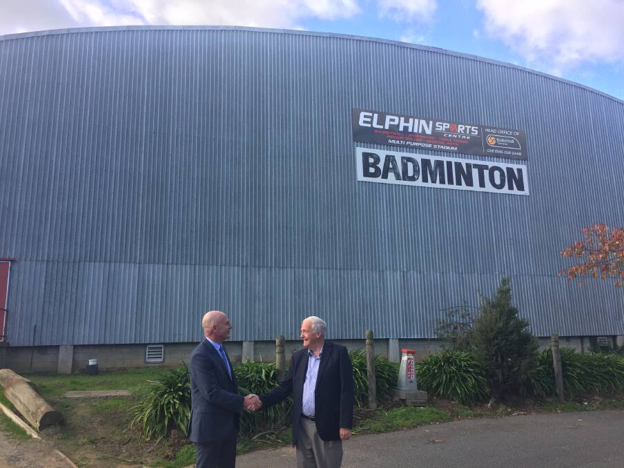 State treasurer Peter Gutwein and Elphin Sports Centre president Peter Dunphy shake hands in front of the soon-to-be upgraded hall. Picture: Josh Partridge