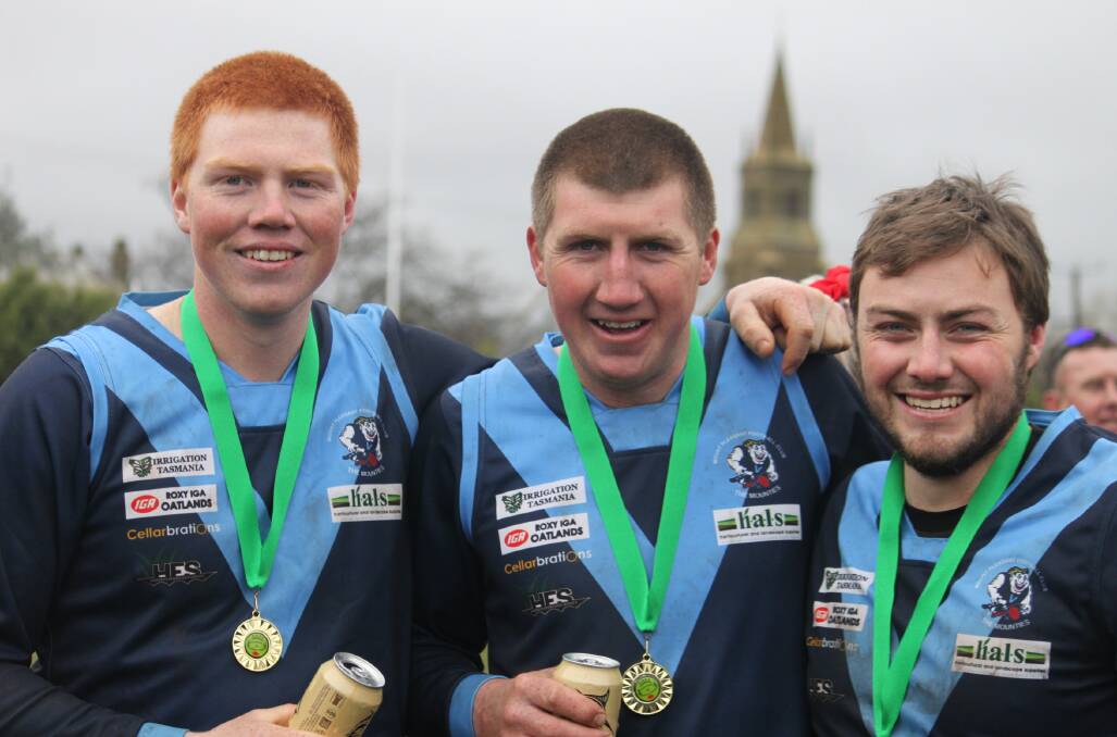 Brothers in arms: Mitch, Rhys and Jordan Byers celebrate Mount Pleasant's premiership victory. Picture: Supplied
