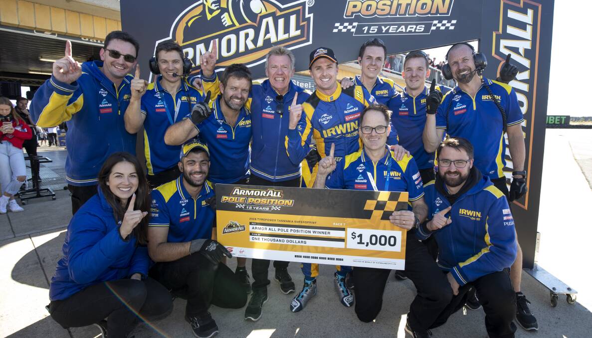 TOP DOG: Mark Winterbottom celebrates with his team after claiming their first-ever pole position at Symmons Plains in 2019. Pictures: Supercars Communications
