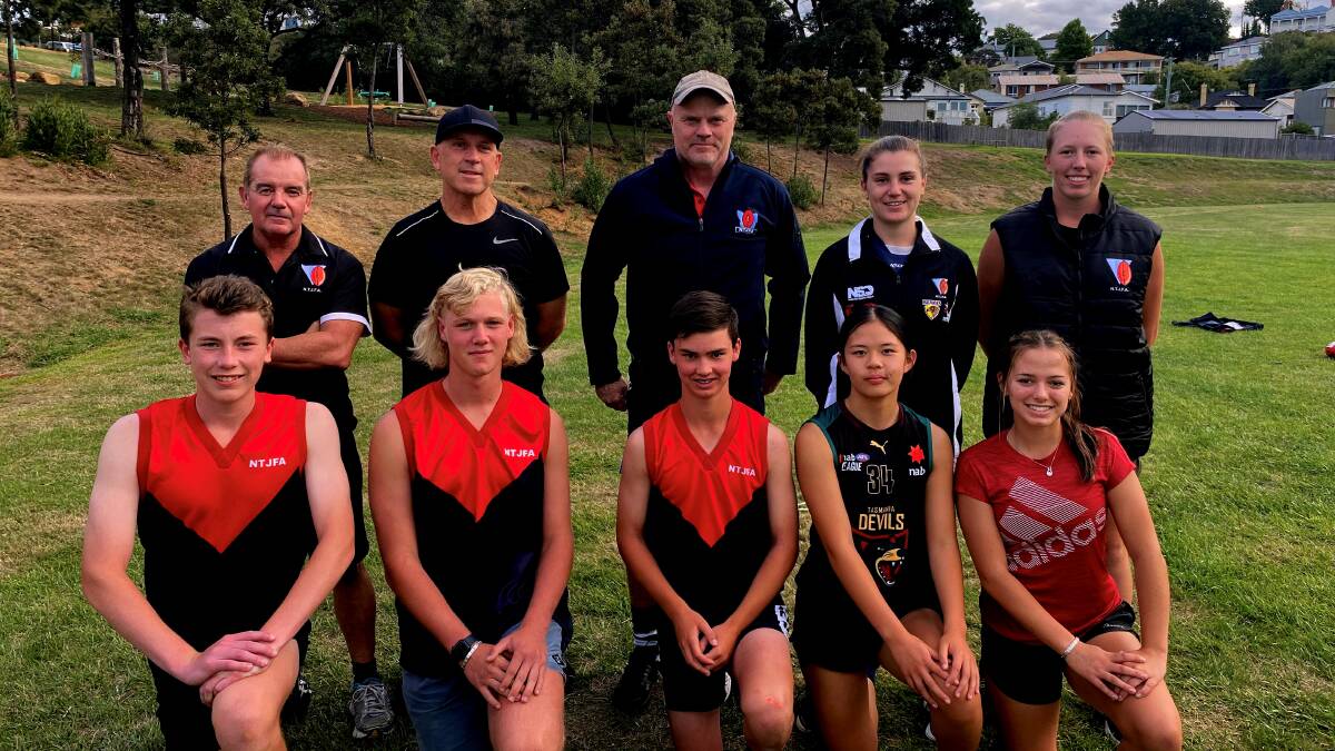 SET TO GO: NTJFA representatives Isaac Smedley, Lochie Harris, Jordan Shipp, Maggie Chen and Ruby Hall with coaches Pacer Markham, Daniel Smedley, Daryl Griffiths, Hayley Whyte and Monique Booth. Picture: Josh Partridge