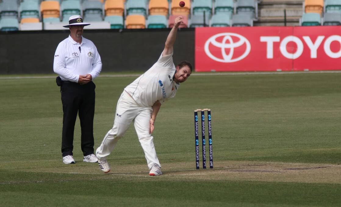 Bowled: Jarrod Freeman sends down a delivery. Picture: Rick Smith