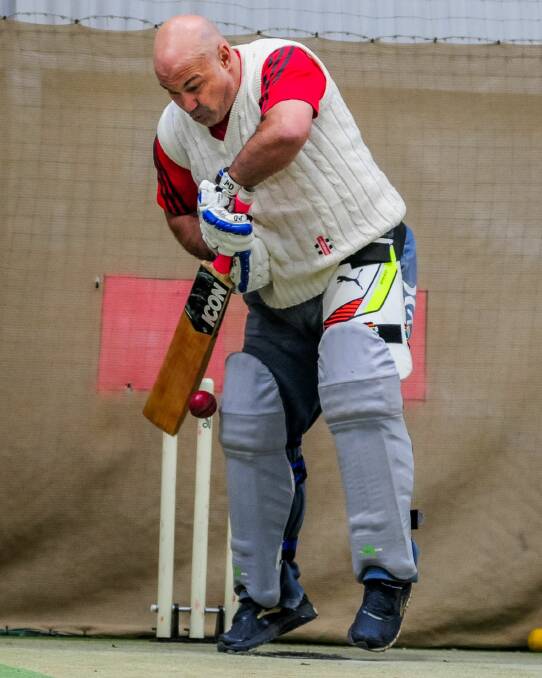 Defending hard: Claude Orlando is made to defend his stumps following a good ball. 