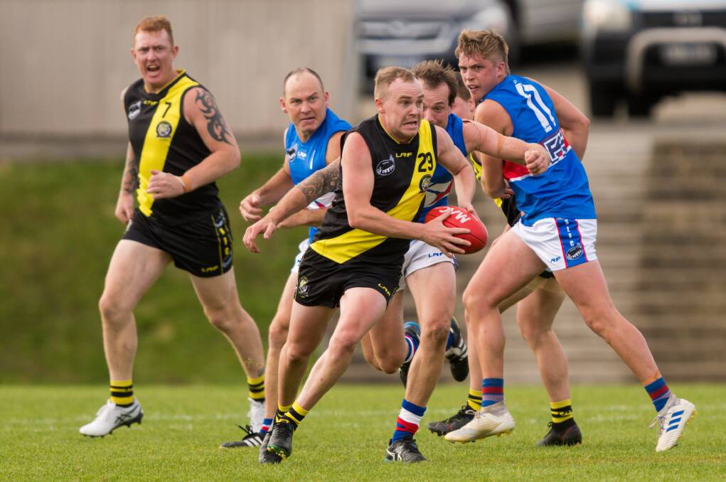 OPEN SPACE: Rocherlea's Mitch Cordell bursts away from the pack. Picture: Phillip Biggs