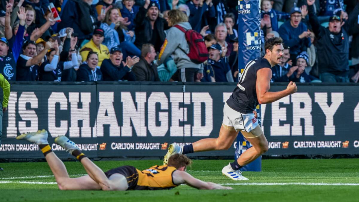Flex: Mitch McGovern celebrates an early goal as the Blues started strong against Hawthorn. 