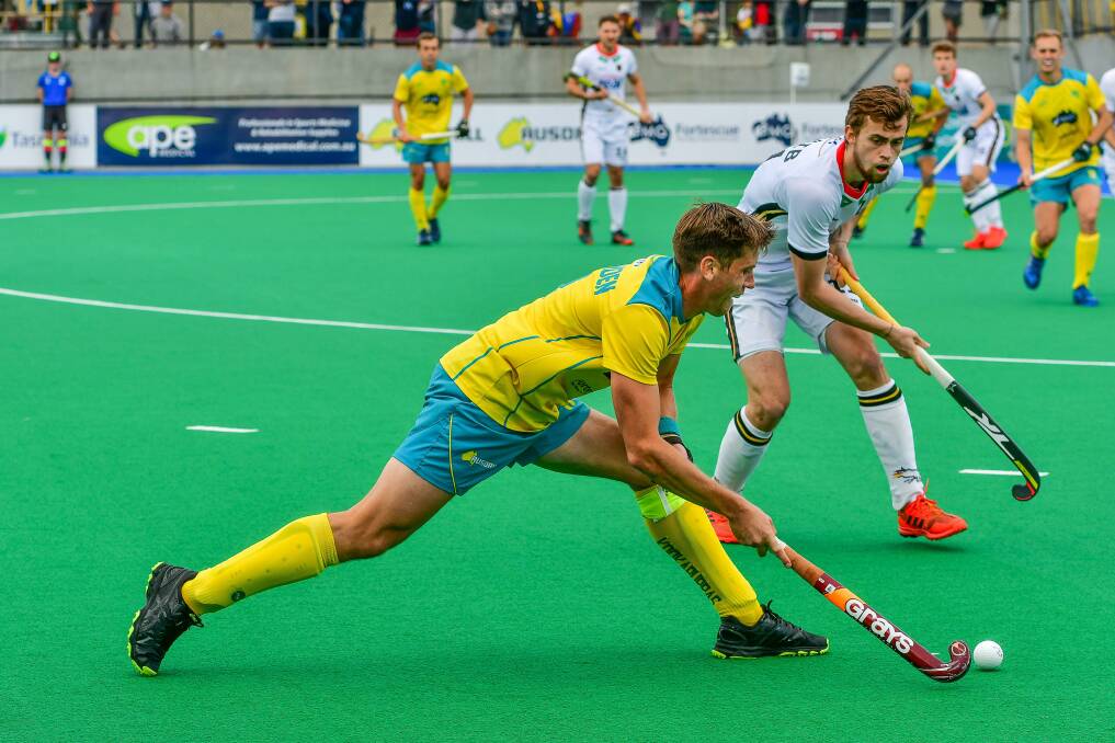Proud and Precise: Eddie Ockenden taking on Germany in Hobart during February. Picture: Scott Gelston.