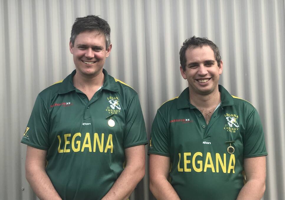 Proud: Club president Chris Demeyer and all-rounder Sam Howe display their Legana Cricket Club life member pins. They were inducted on Saturday. Picture: Josh Partridge