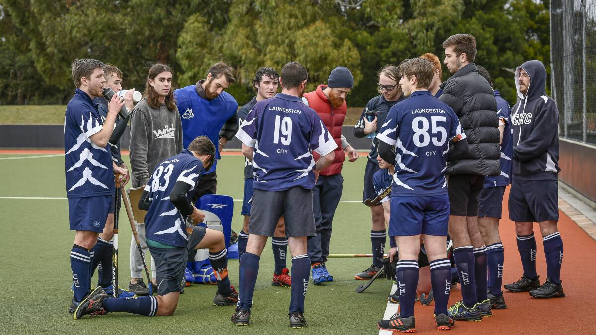 Launceston City convene at half-time during a match last year. Picture: Craig George