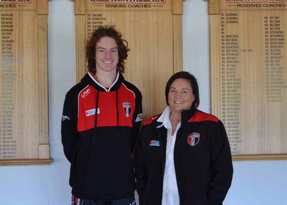 THANKFUL: George Town's Caleb Coghill with club president Lynette Burt. Picture: Freya Jetson
