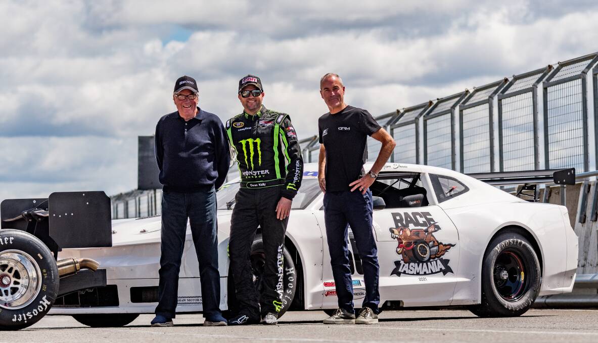 Ready: Race Tasmania organisers Garry and Barry Rogers stand beside of Owen Kelly. Picture: Phillip Biggs