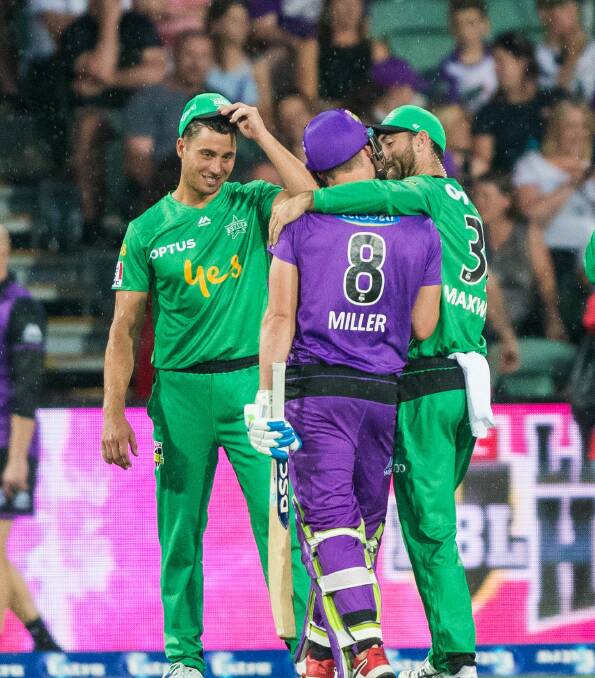 Buddy up: David Miller shares a moment with Marcus Stoinis and Glenn Maxwell. Picture: Phillip Biggs