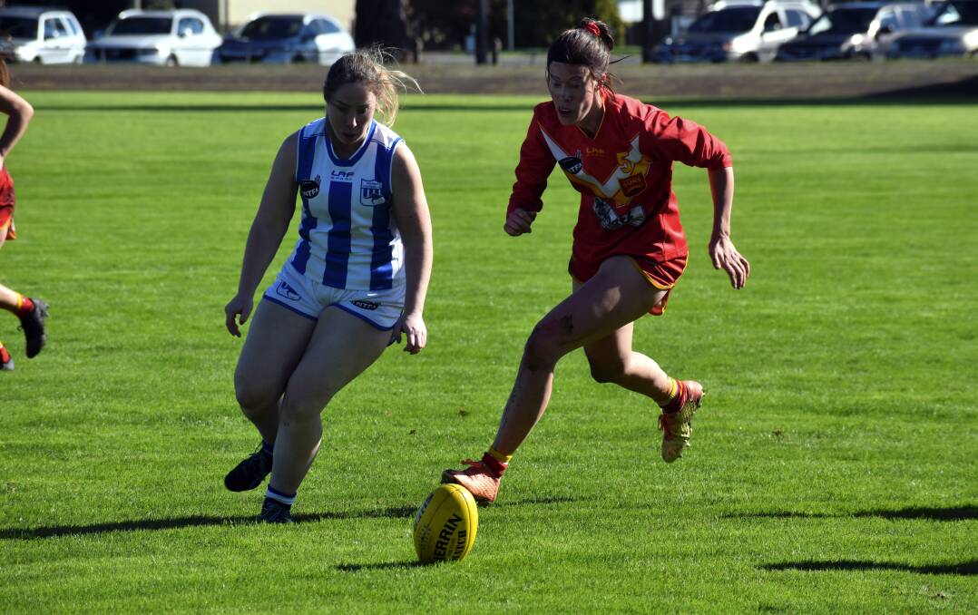IT'S ON: Deloraine's Abbey Cox and Meander Valley's Sophie Townsend battle it out for the ball. Picture: Josh Partridge