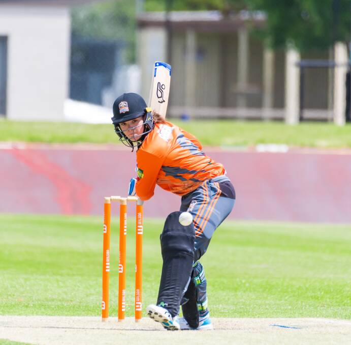 Committed: Emma Manix-Geeves looks to smack a cover drive in her century innings. Picture: Simon Sturzaker