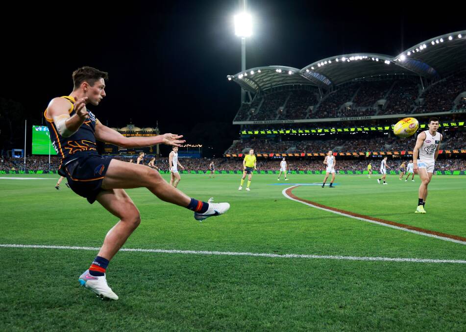 Launceston's Chayce Jones kicks the ball from the boundary during Adelaide's victory over Carlton last Thursday. Picture by Getty Images