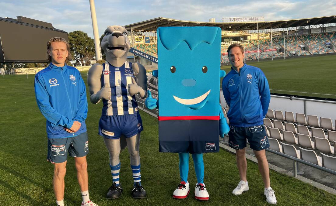 Kangaroos players Miller Bergman and Jared Polec with mascots Kanga and ShorTY. Picture: Supplied