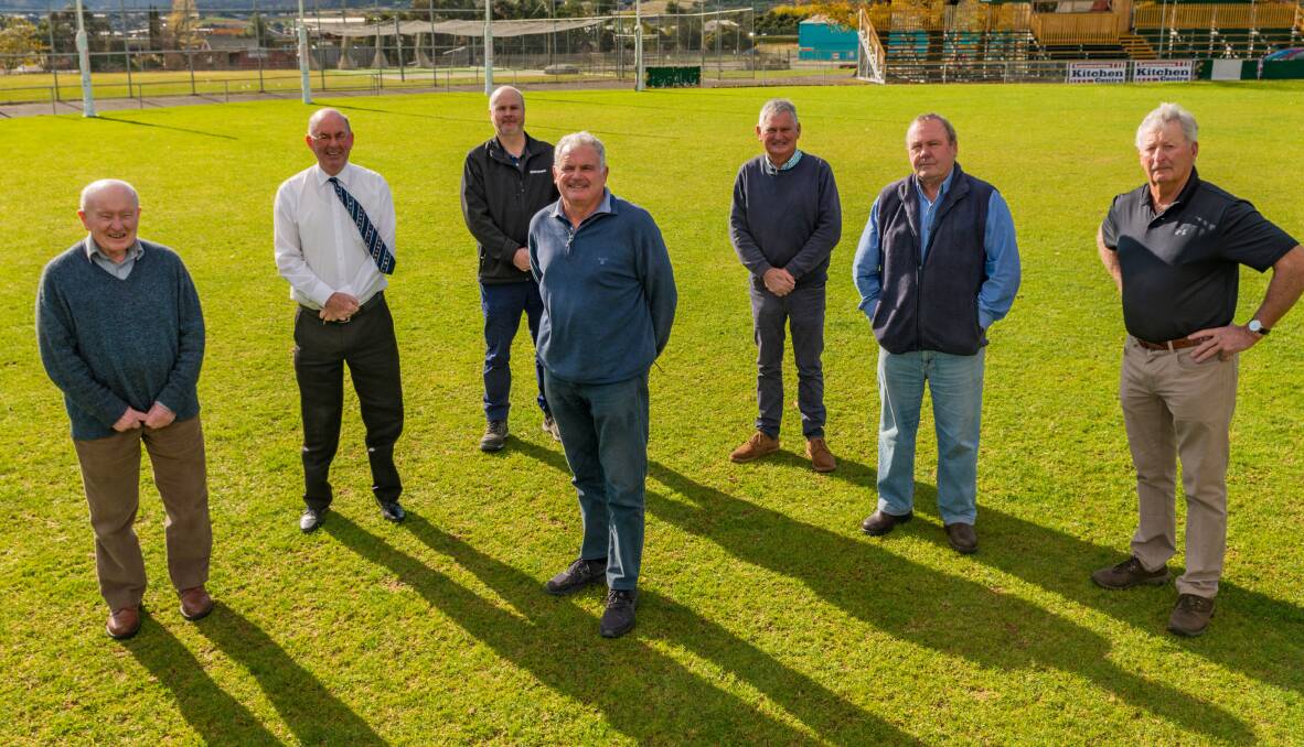 SURROUNDED: Peter Gatenby stands front and centre in a group full of Cricket North icons. Picture: Phillip Biggs