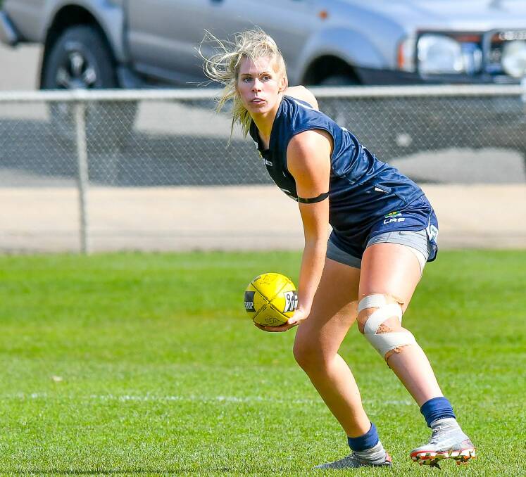 Tall order: Launceston ruck Abbey Green and Blues teammate Meg Sinclair were successful in their showings for Melbourne University. Picture: Scott Gelston.