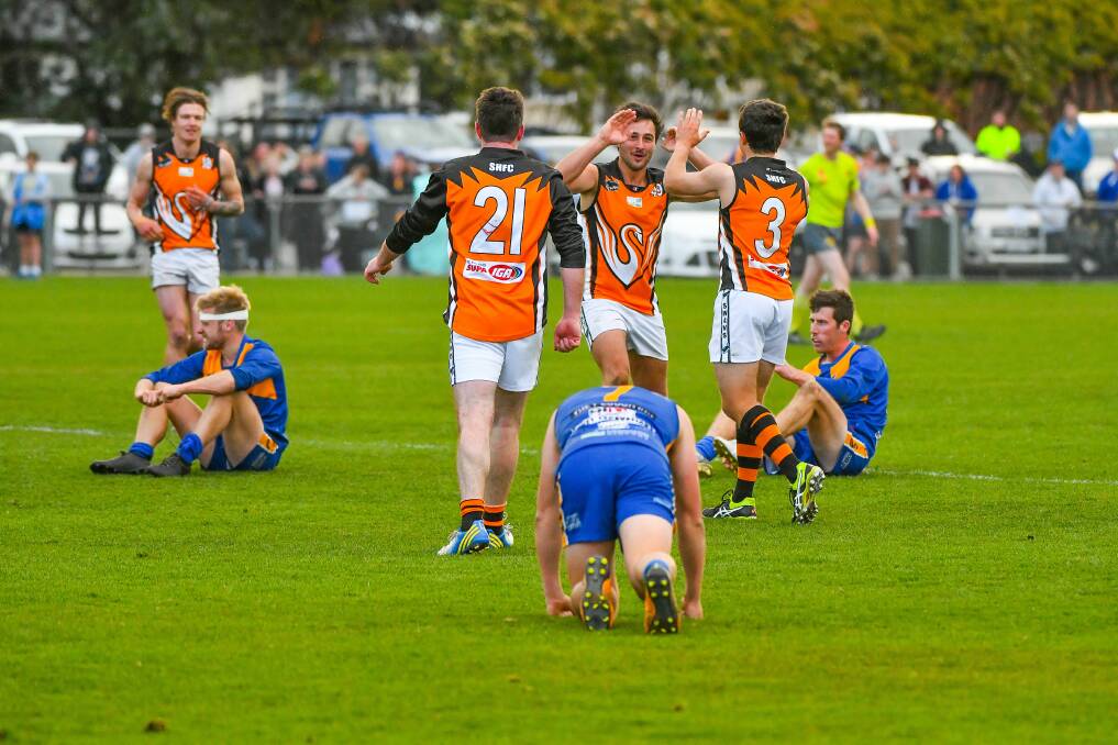 Contrast: Last year's grand final will be fresh in the memories of Eagles players as they face East Coast. Picture: Scott Gelston.