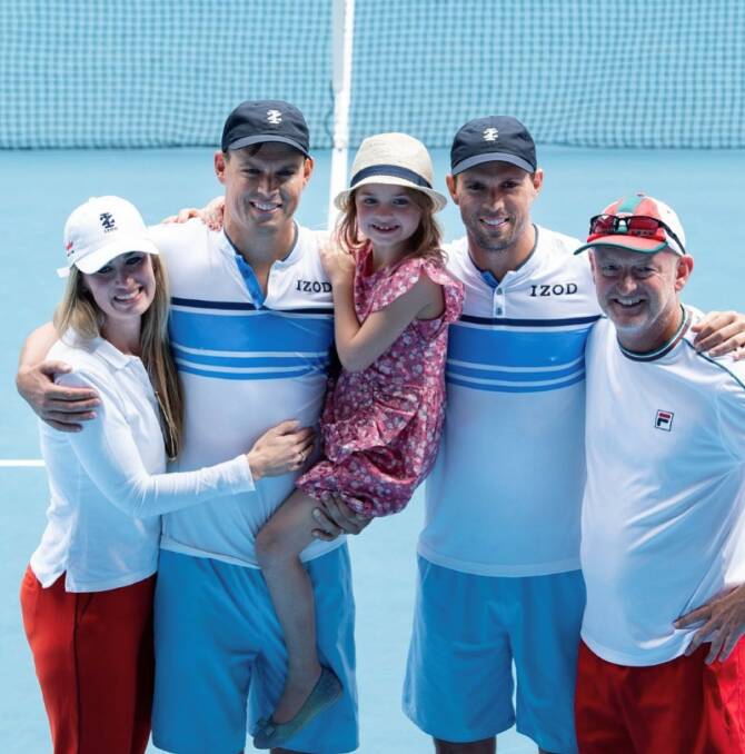 Happy days: Michelle and Bob Bryan with daughter Micaela, Mike Bryan and coach David Macpherson. Picture: Peter Staples, ATP Tour.
