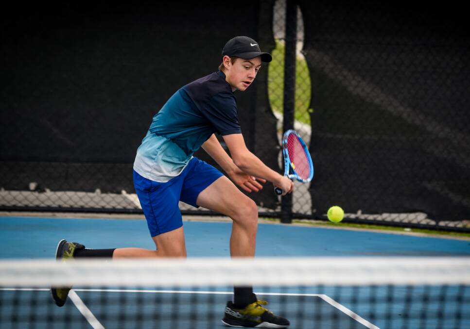 Precision: Campbell Young embraces tennis' return to the courts at the Launceston Regional Tennis Centre on Monday. Picture: Paul Scambler