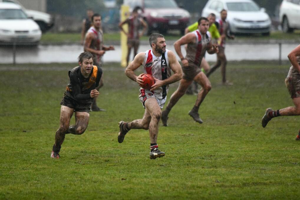 On the run: Luke Crane has been exceptional for George Town this season. Picture: Paul Scambler