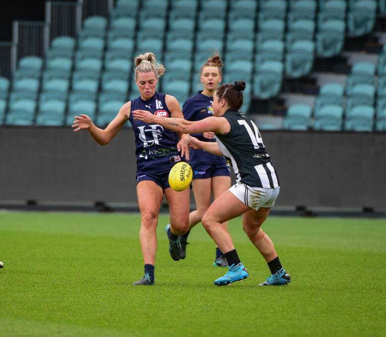 UNDER PRESSURE: Jen Guy gets a kick away for Launceston in the 2020 TSLW grand final against Glenorchy. Picture: Paul Scambler