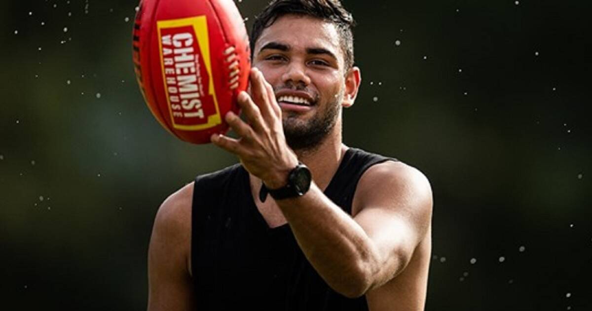 Setting the bar: Training heavily during isolation, North Melbourne's Tarryn Thomas impressed in their return victory. Picture: AFL Photos