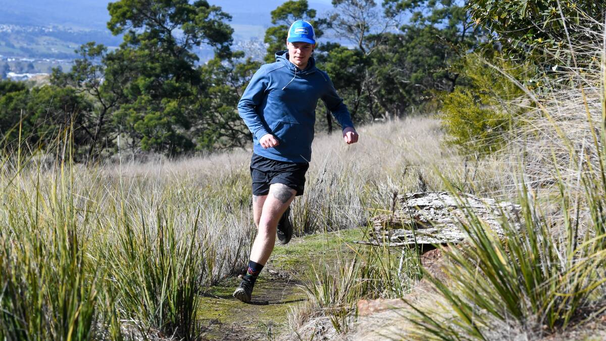 Tim Gambles completing 24-hour backyard trail run for cancer