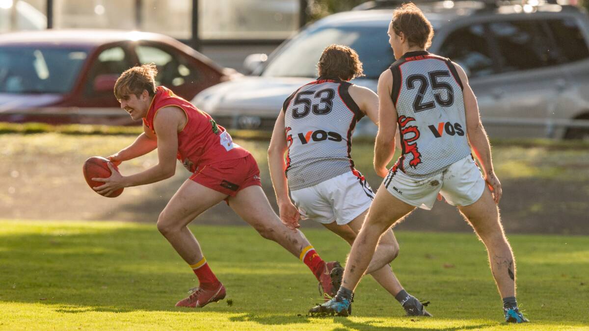 BURSTING: Meander Valley's Brodie Vocke aims to pull away from UTAS rivals. His Suns face Old Launcestonians this week after a determined showing against Old Scotch. Picture: Phillip Biggs