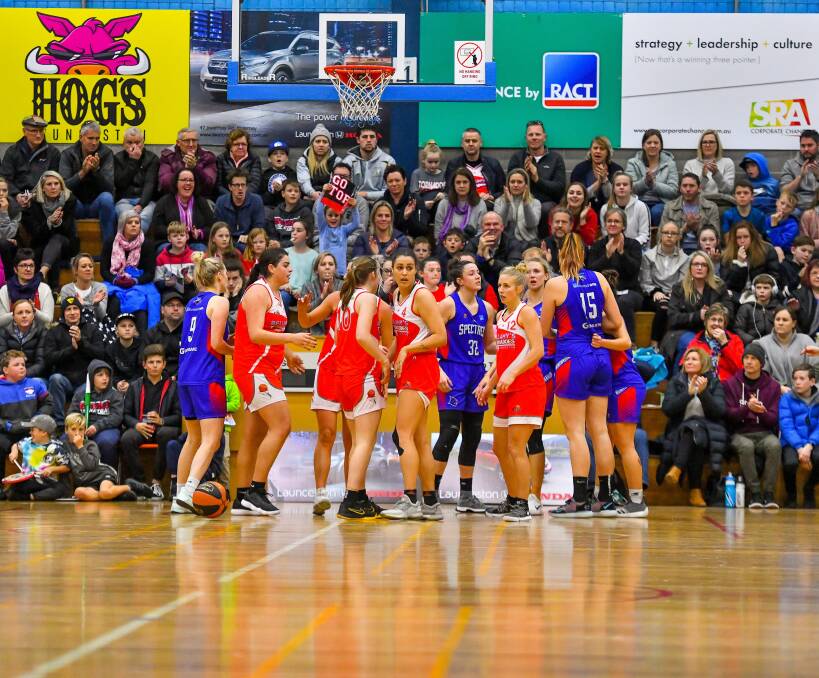 Good times: Launceston Tornadoes enjoy victory after defeating the Nunawading Spectres to win the SEABL preliminary final in 2018 at the Elphin Sports Centre.