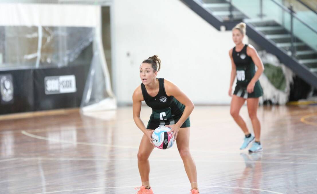 Pounced: Vanessa Augustini looks to pass from the tip-off at a training session. Picture: Magpies Netball.