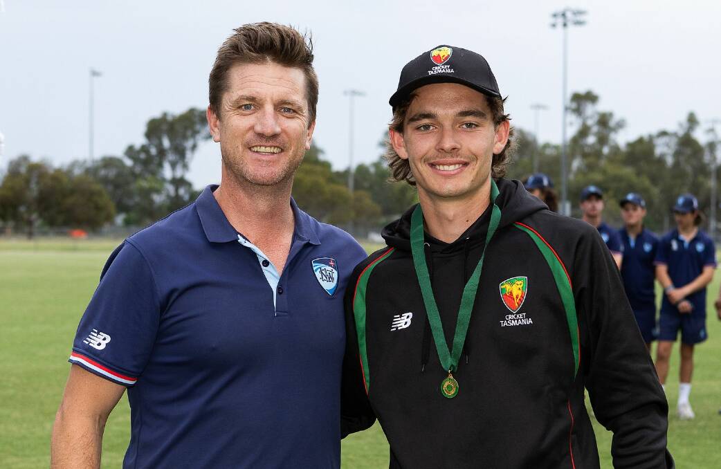 Aidan O'Connor receives his medal for player of the tournament at the under-19 nationals championships. Picture by Cricket Australia