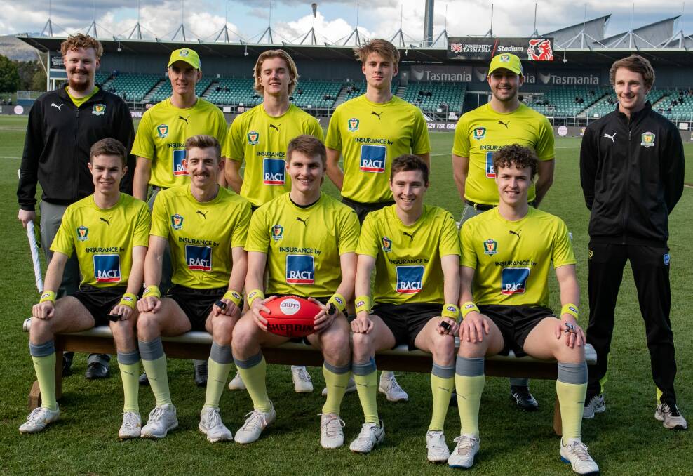 History-makers: Casey Fellows (front, middle) and Tom McIntee (front, second from right) are the first two Northern Tasmanians to umpire a TSL grand final together. Kaleb Lee (back left), Dom Schiliro (front left) and Ollie Bennett (front right) are also from Launceston. Picture: Paul Scambler