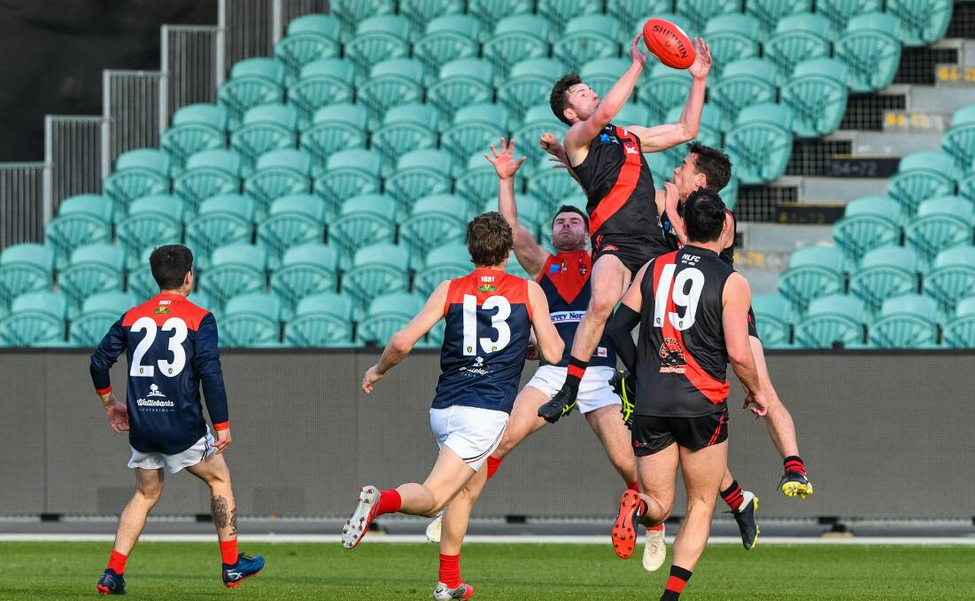 Fletcher Bennett soars high. Picture: Phillip Biggs