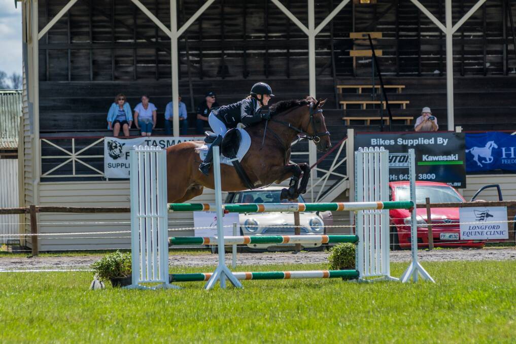 Expert: Eve Hall riding Idolised in last year's state titles at Westbury. Picture: Phillip Biggs