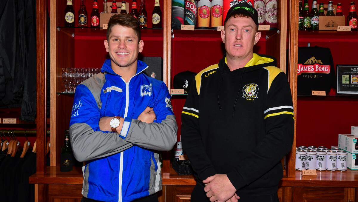 Business as usual: Opposing coaches Lochy Dornauf and Andrew Cox-Goodyer stand side by side ahead of Saturday's NTFA grand final. Picture: Neil Richardson