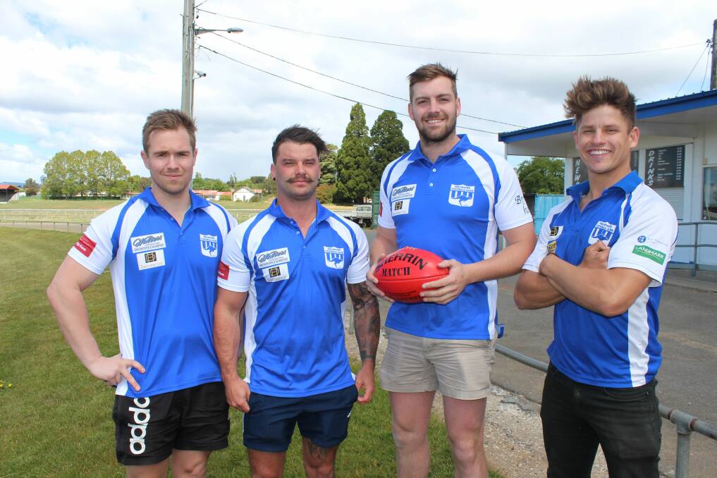 NEW ROOS: Deloraine coach Lochy Dornauf (right) with a handful of his new recruits - Jake Freshney, Dalton Murfett and Brayden Butler. Picture: Hamish Geale 