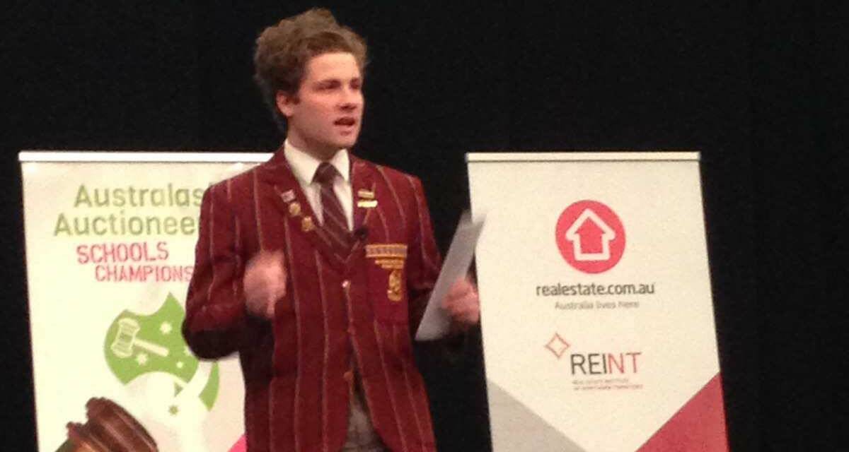 ON POINT: Carlton in the midst of his championship winning auction at the Australiasian Schools Auctioneering Championship.
