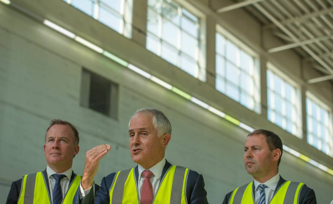 GRAND PLAN: Premier Will Hodgman, Prime Minister Malcolm Turnbull and Energy Minister Josh Frydenberg discuss hydro power in Tasmania. Picture: Scott Gelston