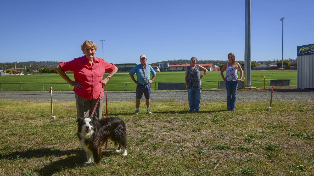 CONCERN: Youngtown residents Pamela Skeggs and dog "Prince", John Cooper, Eve Bailey and Lisa Bailey at the fenceline of the oval. Picture: Pual Scambler.