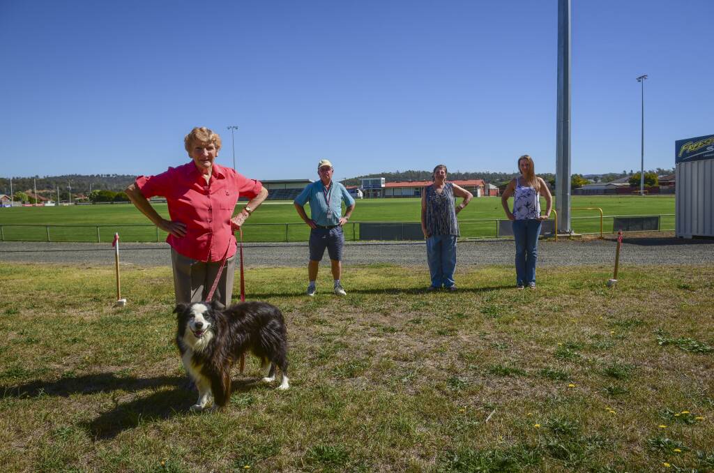 CONCERN: Youngtown residents Pamela Skeggs and dog "Prince", John Cooper, Eve Bailey and Lisa Bailey at the fenceline of the oval. Picture: Pual Scambler.