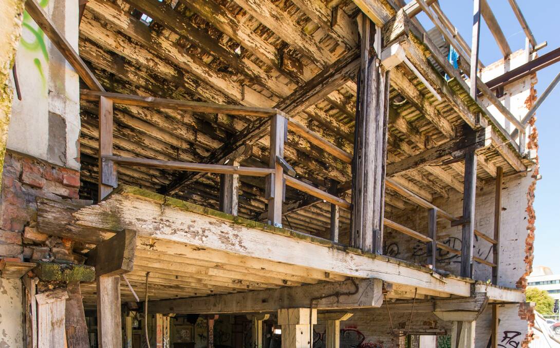 INSIDE LOOK: The internal timber structure at 22 and 24 Charles Street is at the heart of an appeal lodged by the Heritage Protection Society (Tasmania). Picture: Phillip Biggs 