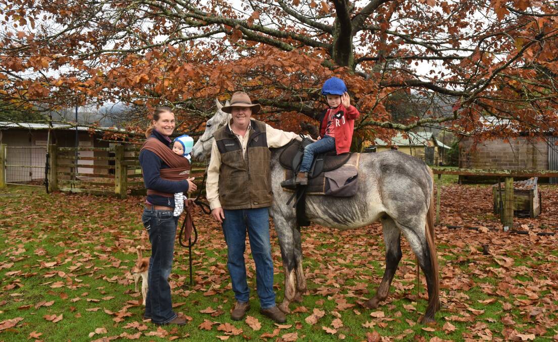 NEW VENTURE: Cradle Country Adventures owners Laura and Ray Becker with Ned, Liam and Stingo the horse. Picture: Neil Richardson