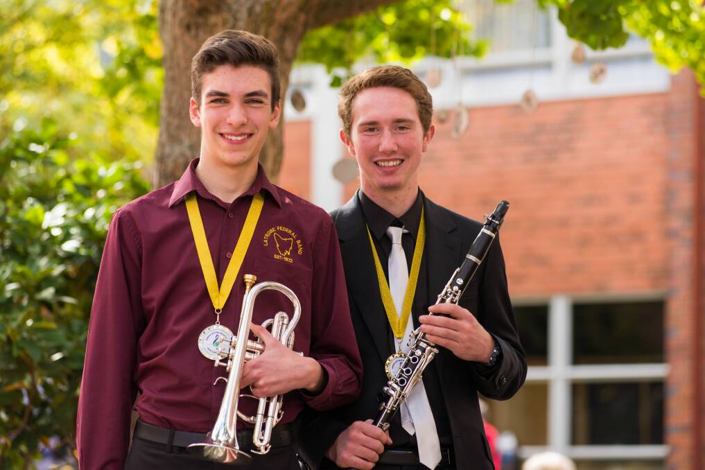 NEW FRIENDS: Cornet player Jesse Spratt of Port Sorell, of Latrobe Federal Band, and clarinet player Sascha Graham, of Sydney, of Northern Youth Symphonic Winds.