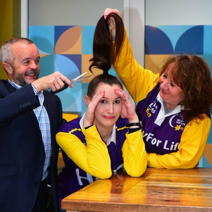 FUNDRAISING DRIVE: Relay for Life team members Wayne Fenton, Sophie Enniss and Sue Fenton planning ahead for their major fundraisers. Sophie and Sue are using gofundme.com ahead of shaving their heads. Picture: Neil Richardson 