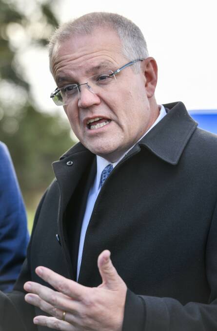 HELP NEEDED: There are calls for Prime Minister Scott Morrison to extend government support to those on temporary visas. Picture: Scott Gelston