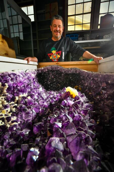 RARE MINERALS: QVMAG Natural sciences curator David Maynard with a huge amethyst geode that will be on display for Science Week. Picture: Scott Gelston 
