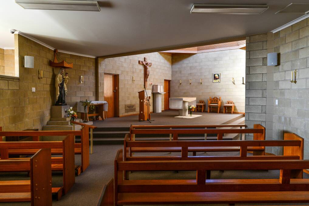 The small church holds a daily mass, with the nuns on the other side of a grille. Picture: Scott Gelston 