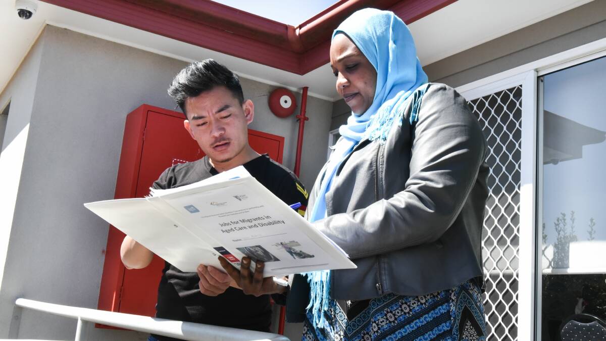 SECOND CHANCE: Mx Pooma, 26, from Bhutan, and Laiela Abdalla, 36, from Sudan, are halfway through their training to work in aged care and disability support. Picture: Neil Richardson 