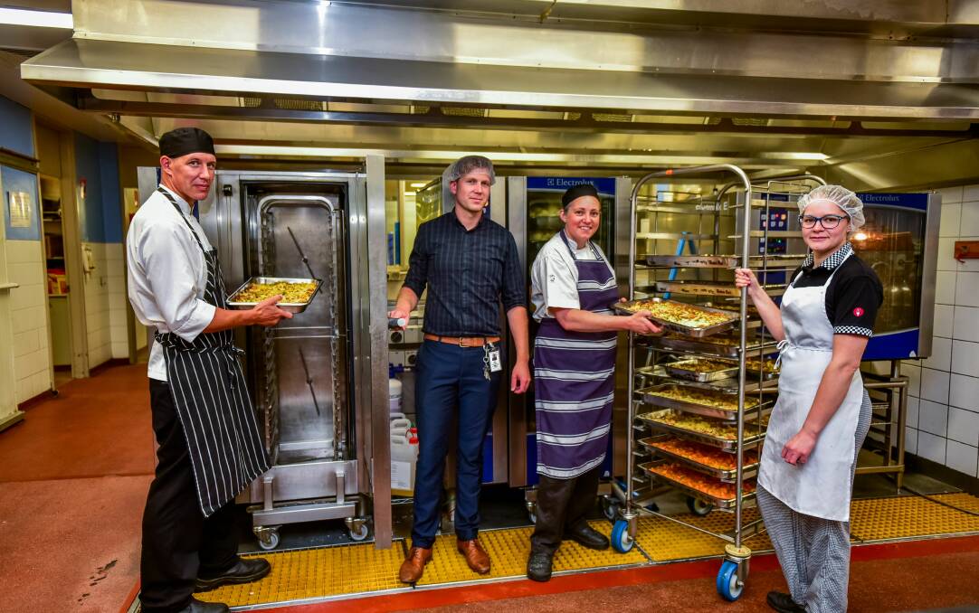 MASTERCHEFS: Jamie Huddleston, Jason Cundall, Freya Stokell and Jasmine Nelson are part of the team supplying meals for firefighters. Picture: Neil Richardson